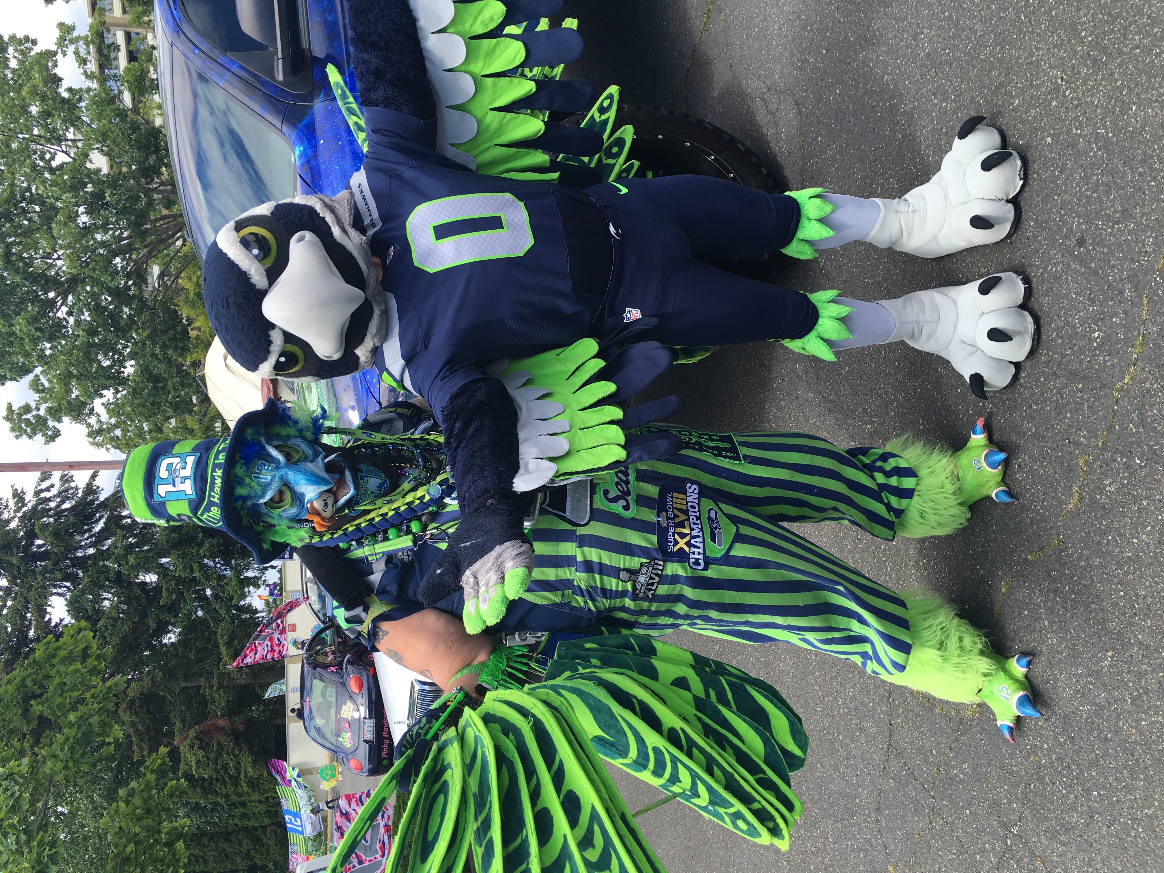 Hawk in the Hat posing alongside Blitz in full gear and talons