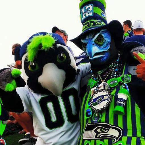Hawk in the Hat post-game celebration pose with Boom